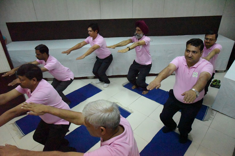 Employees of PPAC performing Yoga in office on International Yoga Day