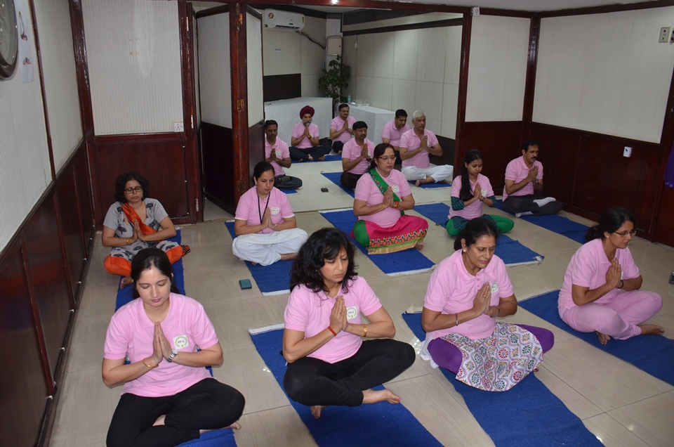 Employees of PPAC performing Yoga on International Yoga Day